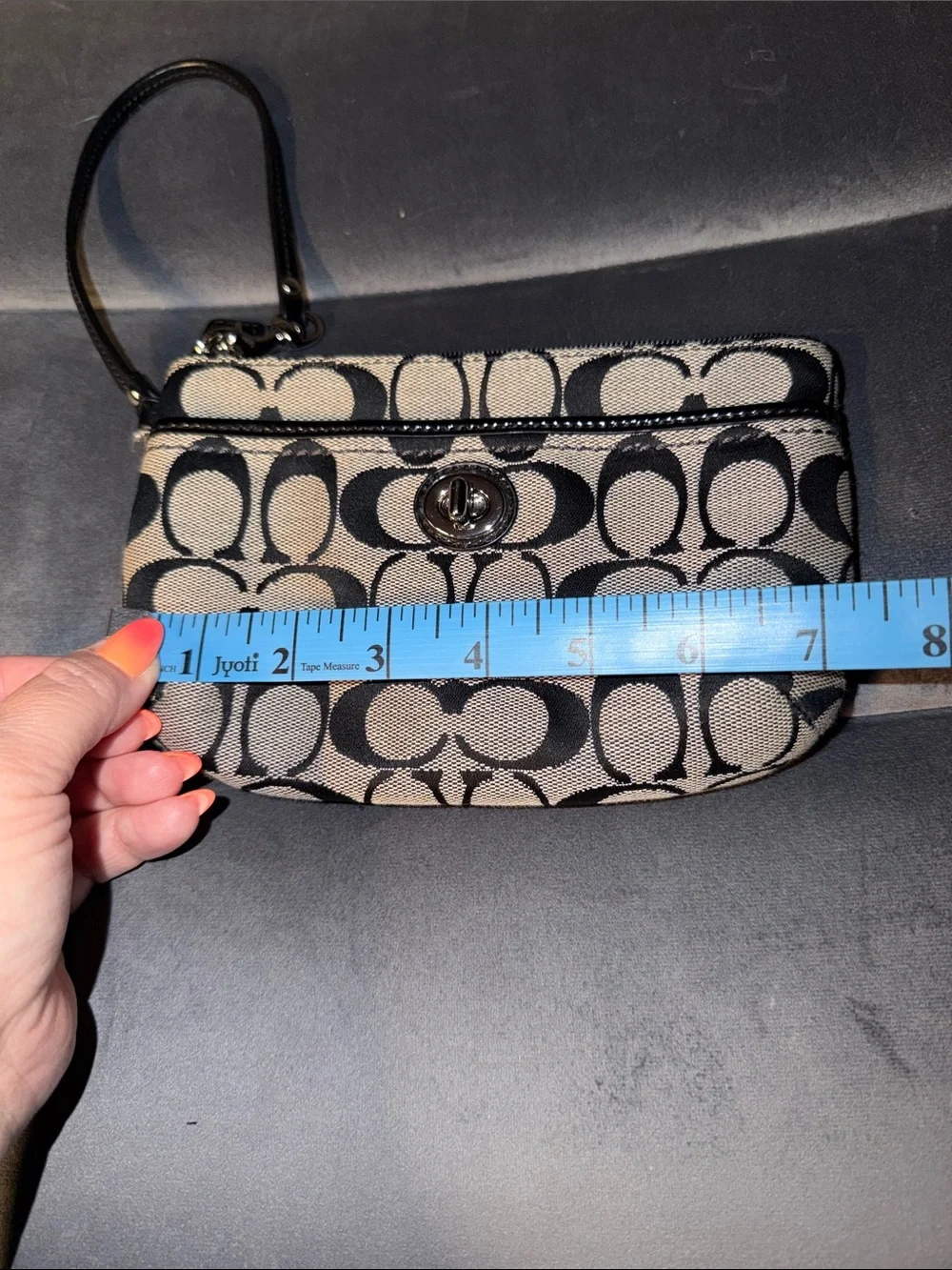 Coach Black and Tan Signature Wristlet with Turn-Lock
